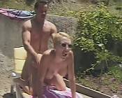 Blonde in sunglasses with melon tits gets fucked doggie style